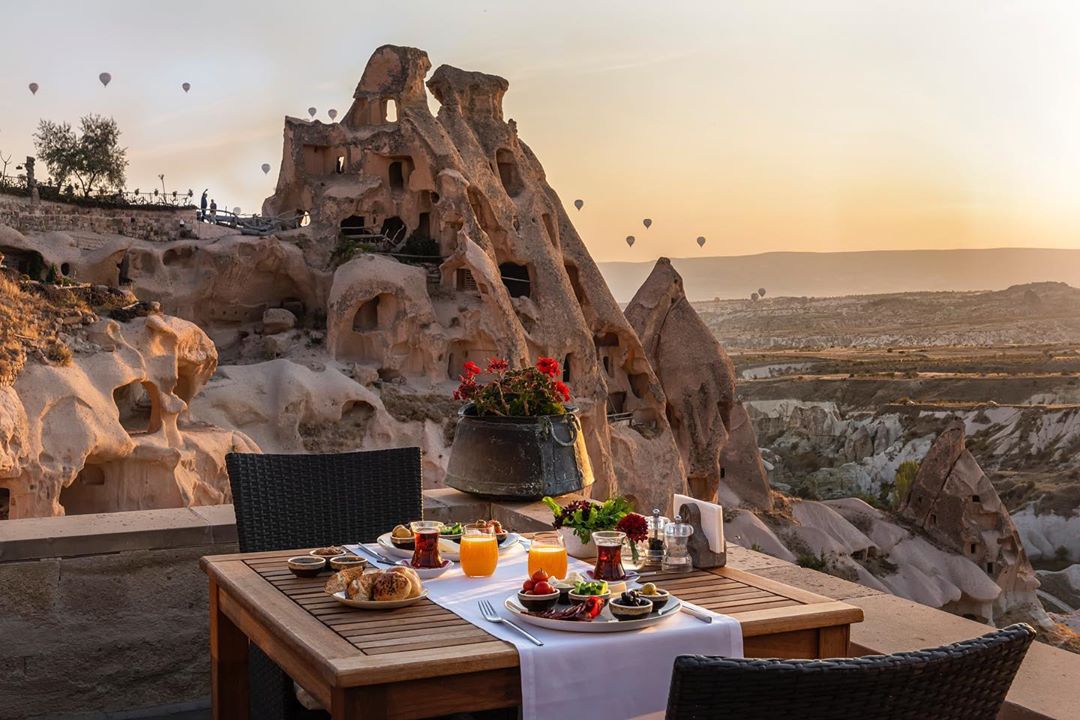 Enjoy breakfast with a view of the honeycomb hills and magical fairy chimneys in Turkey’s hilltop village, Uçhisar at @argosinCappadocia – a perfect way to spend #Valentines weekend.
