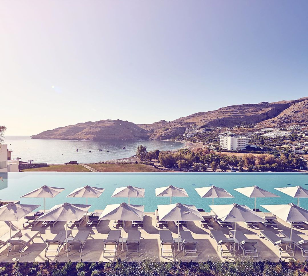 Rhodes is blessed with some of the most beautiful sunsets in the world and there’s no better place to admire them from than @lindos_grand_resort 🌞✨⁣
⁣
Opening this summer, the brand-new luxury resort provides an indulgent adults-only retreat nestled in the tranquil cove of Vlycha 🌊⁣
⁣
#DreamNowGoLater #OneDaySoon #ArmChairTravel #LindosGrand #FoxCommsTravel #Rhodes ⁣