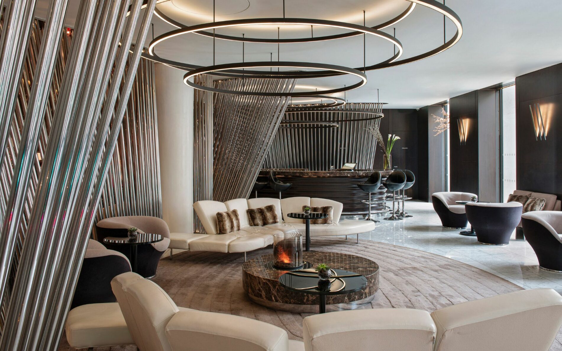 image of a hotel lobby are with comfy sofas and modern design luxury travel lifestyle pr